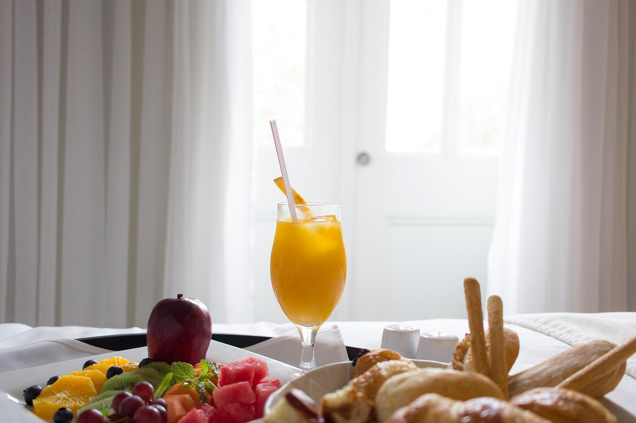 Central Hotel Panama Casco Viejo Exterior photo A glass of orange juice